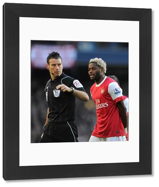 Alex Song (Arsenal) and referee Mark Clattenburg. Manchester City 0: 3 Arsenal