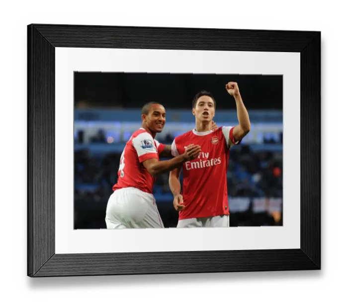 Framed Print : Arsenal's Triumph: Theo Walcott and Samir Nasri's Jubilant Celebration of Bendtner's Goal (3-0 vs Manchester City, 2010)