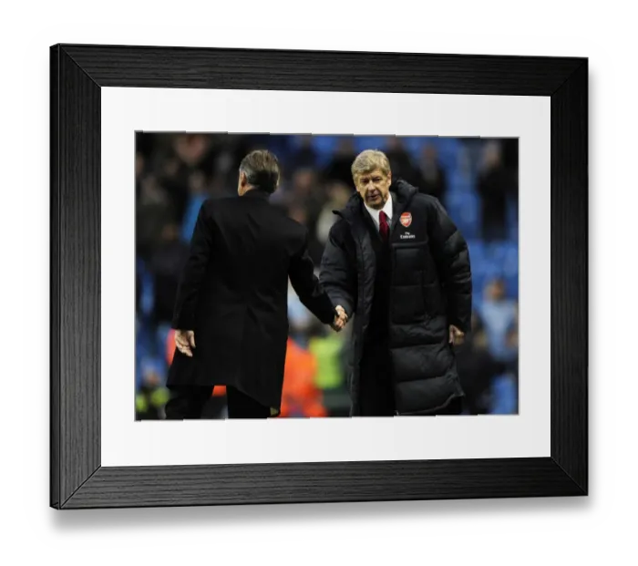 Framed Print : Managers Arsene Wenger (Arsenal) and Roberto Mancini (Man City) shake hands ast the end of the match. Manchester City 0: 3 Arsenal, Barclays Premier League, City Of Manchester Stadium, Manchester, 24  /  10  /  2010. Credit : Stuart MacFarlane  /  Arsenal