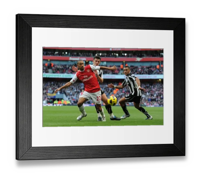 Framed Print : Gael Clichy (Arsenal) Joey Barton (Newcastle). Arsenal 0: 1 Newcastle United Framed Print : Gael Clichy (Arsenal) Joey Barton (Newcastle). Arsenal 0: 1 Newcastle United