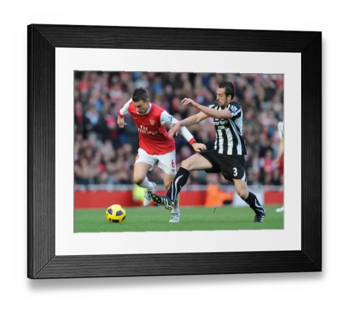 Framed Print : Laurent Koscielny (Arsenal) Jose Enrique (Newcastle). Arsenal 0: 1 Newcastle United Framed Print : Laurent Koscielny (Arsenal) Jose Enrique (Newcastle). Arsenal 0: 1 Newcastle United