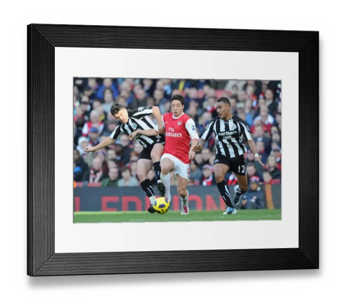 Framed Print : Samir Nasri (Arsenal) Joey Barton and Danny Simpson(Newcastle). Arsenal 0 Framed Print : Samir Nasri (Arsenal) Joey Barton and Danny Simpson(Newcastle). Arsenal 0