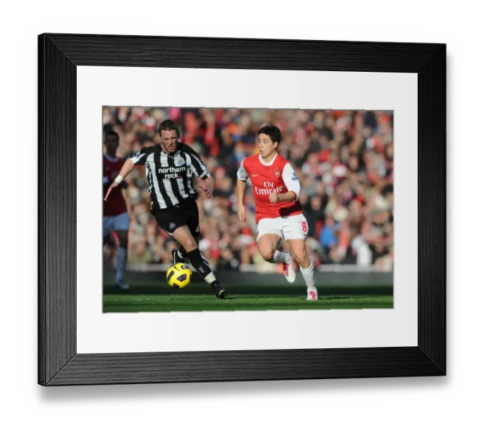 Framed Print : Nolan Stuns Arsenal: Kevin Nolan Scores the Winner Against Arsenal Football Club at Emirates Stadium in 2010 Barclays Premier League