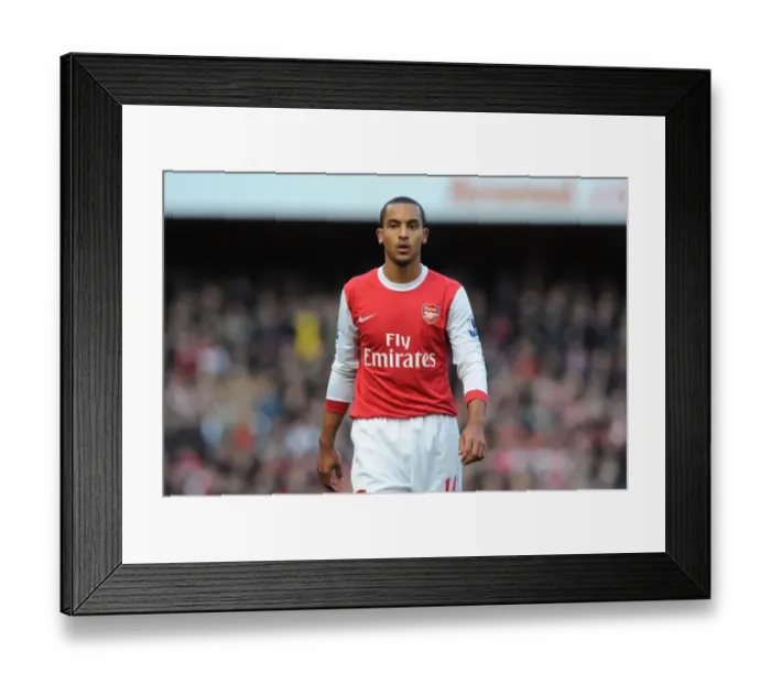 Framed Print : Theo Walcott's Stunner: Newcastle United's Upset Win over Arsenal in the Premier League