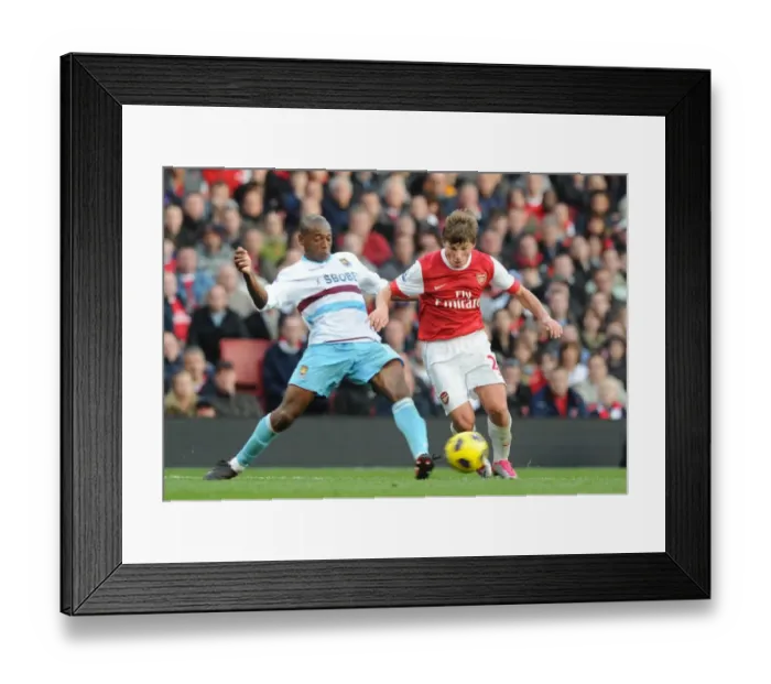 Framed Print : Andrey Arshavin (Arsenal) Luis Boa Morte (West Ham). Arsenal 1: 0 West Ham United