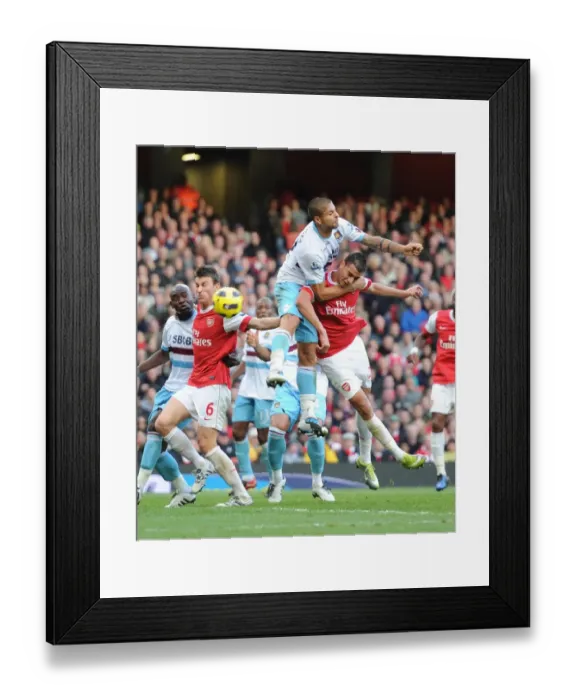 Framed Print : Marouane Chamakh (Arsenal) Manuel Da Costa (West Ham). Arsenal 1: 0 West Ham United Framed Print : Marouane Chamakh (Arsenal) Manuel Da Costa (West Ham). Arsenal 1: 0 West Ham United