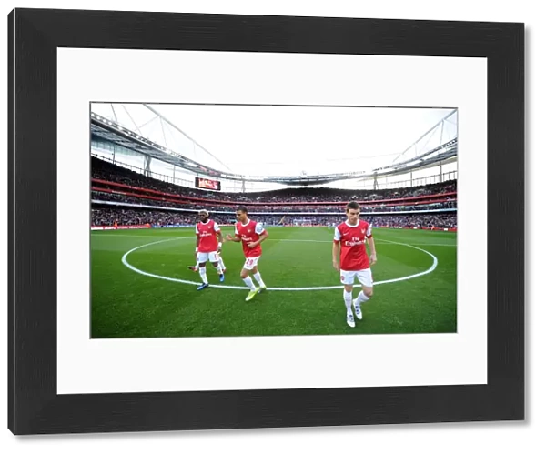 Laurent Koscielny, Marouane Chamakh and Alex Song (Arsenal). Arsenal 1: 0 West Ham United