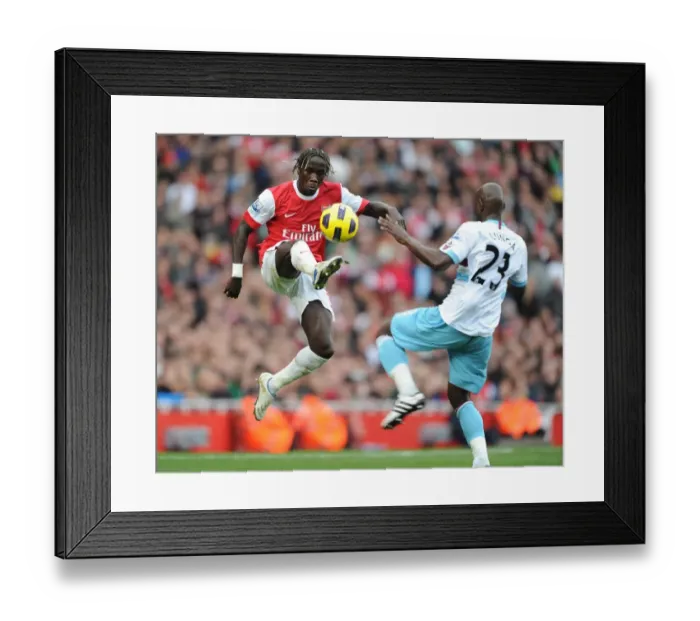 Framed Print : Bacary Sagna (Arsenal) Herita Ilunga (West Ham). Arsenal 1: 0 West Ham United
