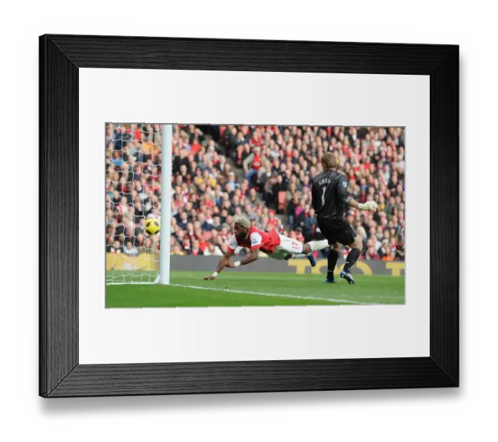 Framed Print : Alex Song heads past West Ham goalkeeper Rob Green to score the Arsenal goal Framed Print : Alex Song heads past West Ham goalkeeper Rob Green to score the Arsenal goal