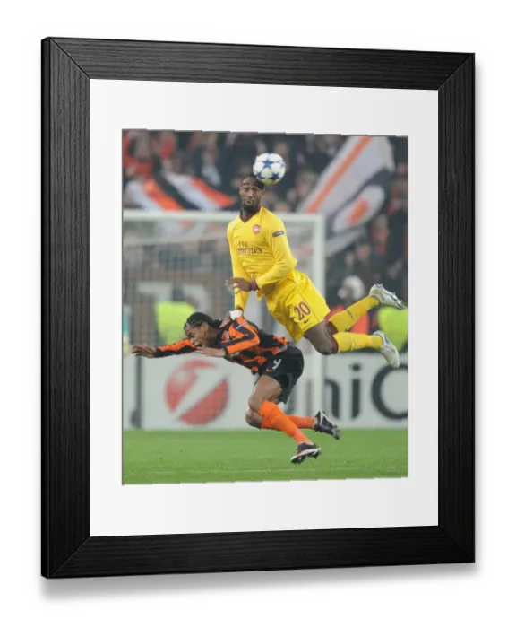 Framed Print : Johan Djourou (Arsenal) Luiz Adriano (Shakhtar). Shakhtar Donetsk 2: 1 Arsenal Framed Print : Johan Djourou (Arsenal) Luiz Adriano (Shakhtar). Shakhtar Donetsk 2: 1 Arsenal