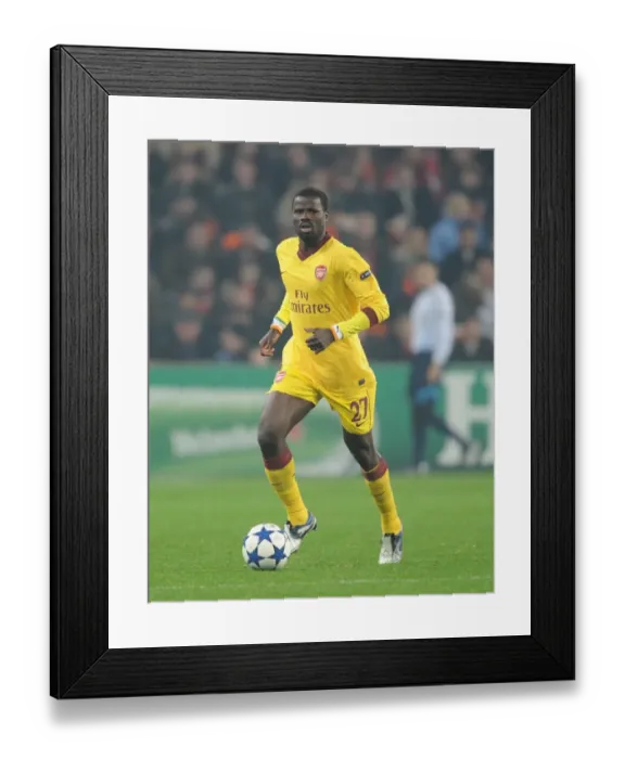 Framed Print : Emmanuel Eboue's Brilliant Performance: Arsenal's 2-1 Defeat to Shakhtar Donetsk in the UEFA Champions League