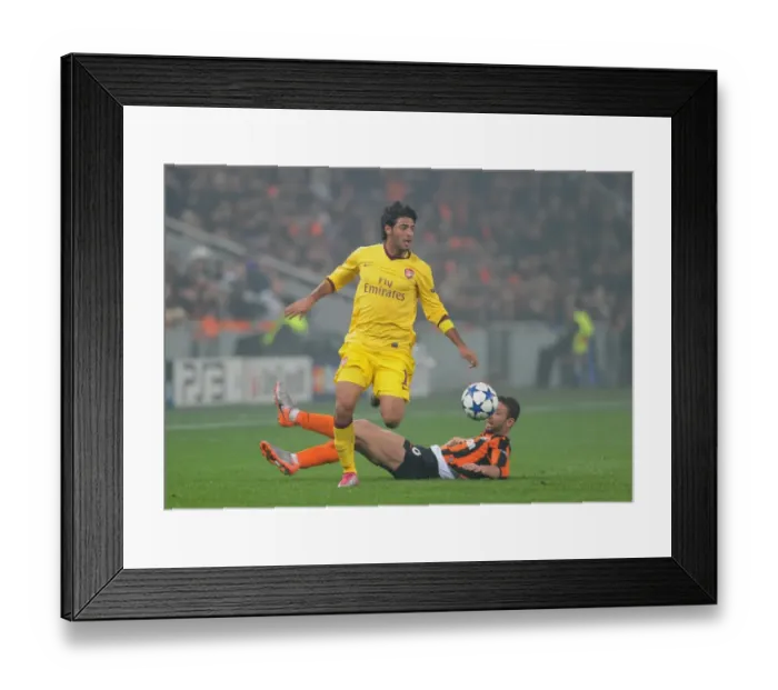Framed Print : Vela Scores Against Rat: Arsenal vs. Shakhtar Donetsk in UEFA Champions League