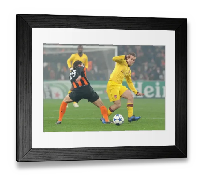 Framed Print : Jack Wilshere vs Olexiy Gai: Shakhtar Donetsk Edge Arsenal 2:1 in UEFA Champions League Group H