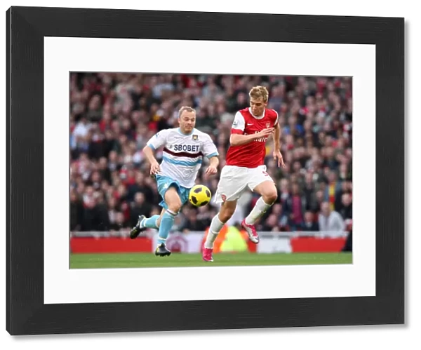 Nicklas Bendtner (Arsenal) Lars Jacobsen (West Ham). Arsenal 1: 0 West Ham United