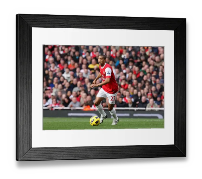 Framed Print : Arsenal's Gael Clichy Secures 1:0 Victory Over West Ham United in Barclays Premier League Framed Print : Arsenal's Gael Clichy Secures 1:0 Victory Over West Ham United in Barclays Premier League