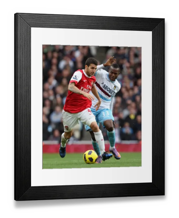 Framed Print : Cesc Fabregas (Arsenal) Victor Obinna (West Ham). Arsenal 1: 0 West Ham United Framed Print : Cesc Fabregas (Arsenal) Victor Obinna (West Ham). Arsenal 1: 0 West Ham United