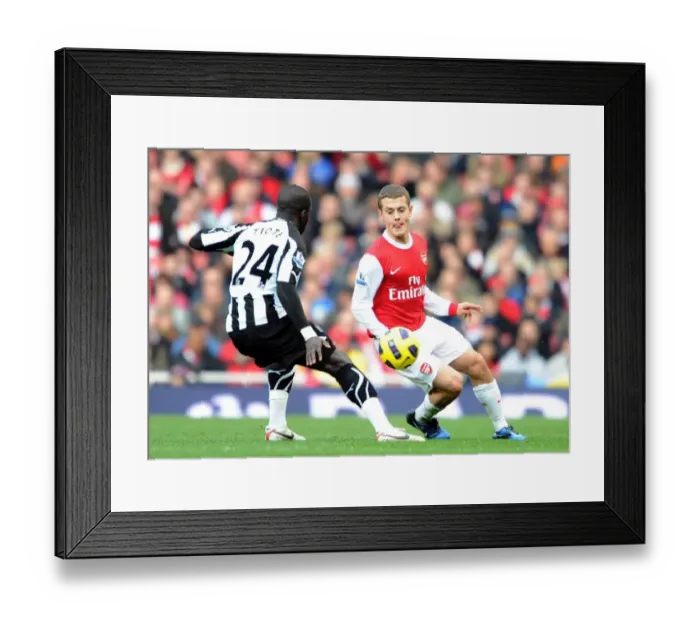 Framed Print : Jack Wilshere (Arsenal) Cheil Tiote (Newcastle). Arsenal 0: 1 Newcastle United