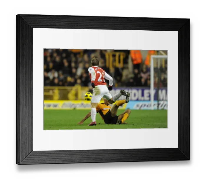 Framed Print : Andrey Arshavin (Arsenal) tackled by Karl Henry (Wolves). Wolverhampton Wanderers 0