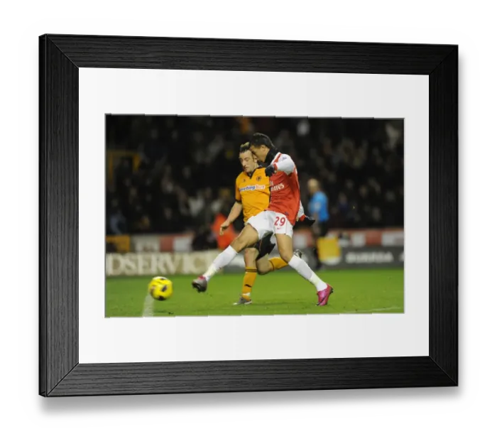 Framed Print : Marouane Chamakh shoots past Wolves goalkeeper Marcus Hahnemann to score the 2nd Arsenal goal Framed Print : Marouane Chamakh shoots past Wolves goalkeeper Marcus Hahnemann to score the 2nd Arsenal goal