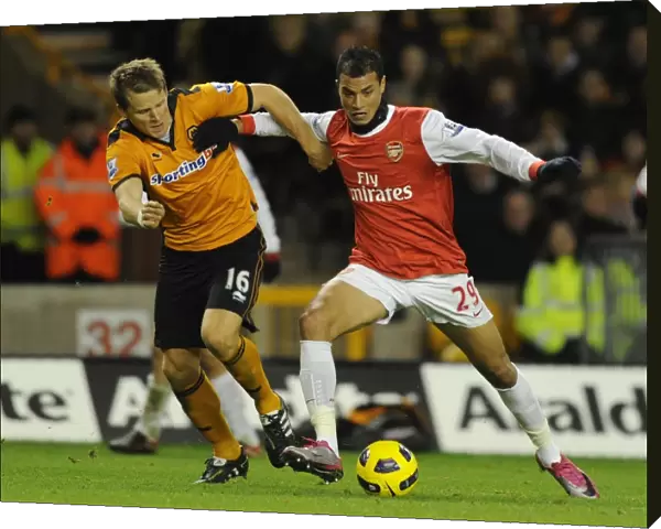 Marouane Chamakh (Arsenal) Christophe Berra (Wolves). Wolverhampton Wanderers 0: 2 Arsenal