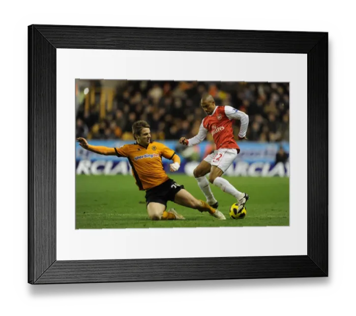 Framed Print : Gael Clichy (Arsenal) Kevin Doyle (Wolves). Wolverhampton Wanderers 0: 2 Arsenal
