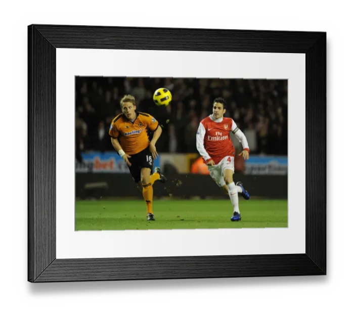 Framed Print : Cesc Fabregas (Arsenal) Christophe Berra (Wolves). Wolverhampton Wanderers 0: 2 Arsenal Framed Print : Cesc Fabregas (Arsenal) Christophe Berra (Wolves). Wolverhampton Wanderers 0: 2 Arsenal