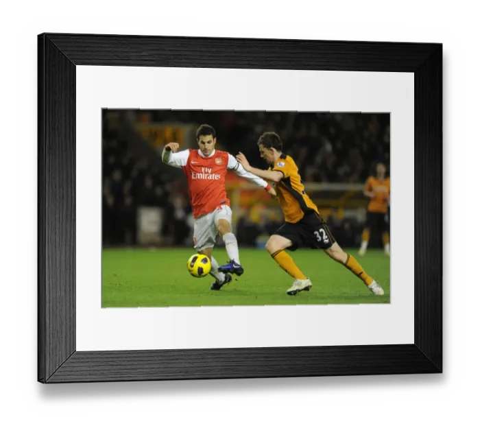 Framed Print : Cesc Fabregas (Arsenal) Kevin Foley (Wolves). Wolverhampton Wanderers 0: 2 Arsenal