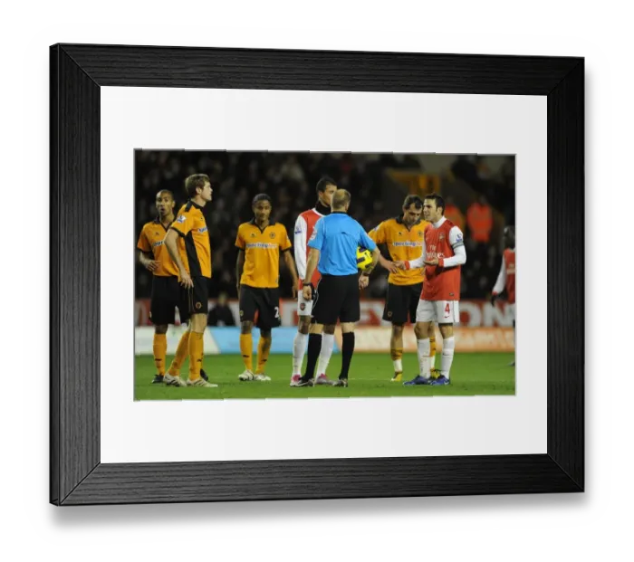 Framed Print : Cesc Fabregas Confronts Referee Mark Halsey During Arsenal's 2-0 Win Over Wolverhampton Wanderers