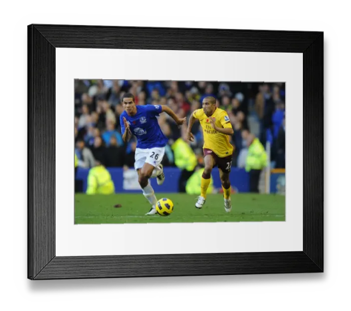 Framed Print : Gael Clichy (Arsenal) Jack Rodwell (Everton). Everton 1: 2 Arsenal, Barclays Premier League Framed Print : Gael Clichy (Arsenal) Jack Rodwell (Everton). Everton 1: 2 Arsenal, Barclays Premier League