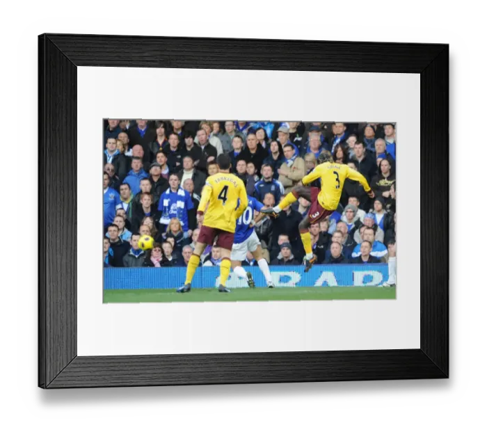 Framed Print : Bacary Sagna shoots past Everton goalkeeper Tim Howard to score the first Arsenal goal Framed Print : Bacary Sagna shoots past Everton goalkeeper Tim Howard to score the first Arsenal goal