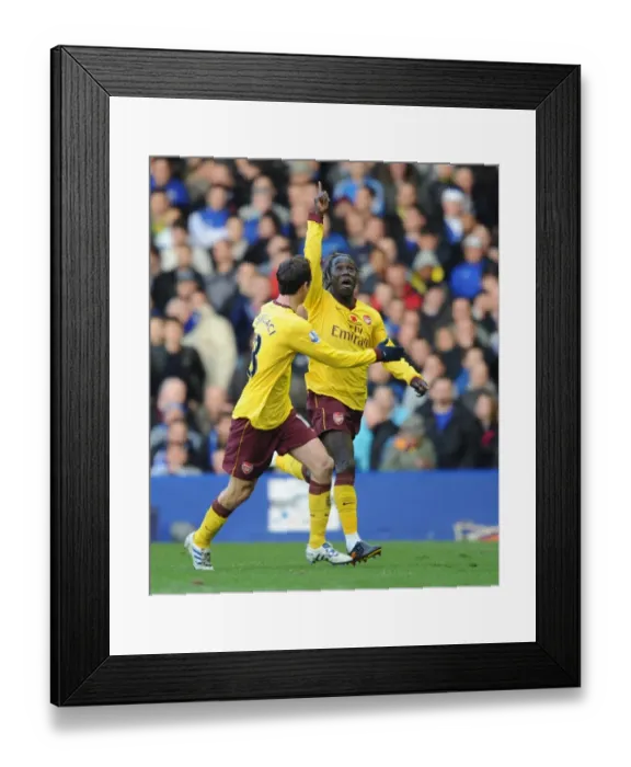 Framed Print : Bacary Sagna celebrates scoring the 1st Arsenal goal with Sebastien Squillaci