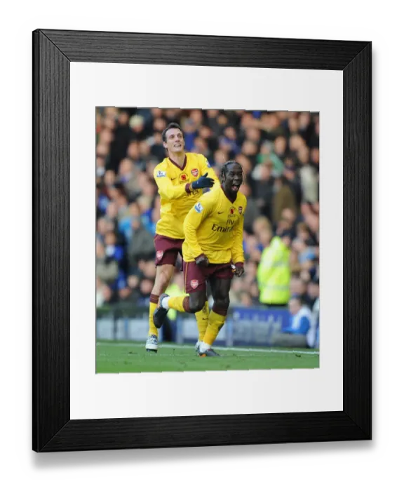 Framed Print : Unforgettable Arsenal Victory: Sagna and Squillaci's Goal Celebration vs. Everton (November 14, 2010)