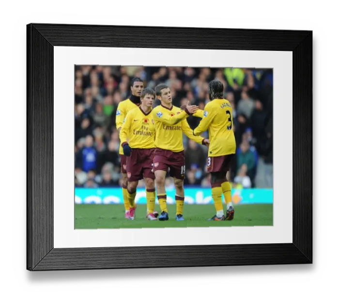 Framed Print : Sagna's Stunner: Arshavin, Chamakh, and Wilshere Celebrate Arsenal's Winning Goal vs. Everton, 2010 Framed Print : Sagna's Stunner: Arshavin, Chamakh, and Wilshere Celebrate Arsenal's Winning Goal vs. Everton, 2010