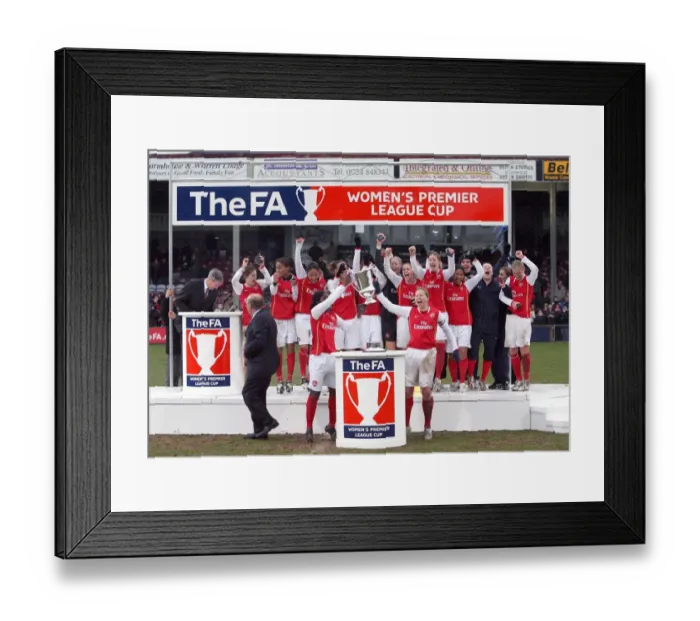 Framed Print : Jayne Ludlow and Anita Asante lift the League Cup Trophy for Arsenal