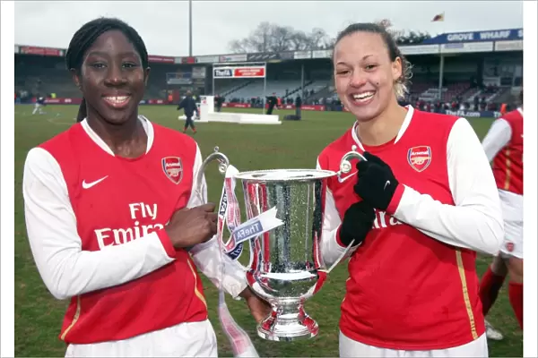 Anita Asante and Lianne Sanderson (Arsenal) with the League Cup Trophy