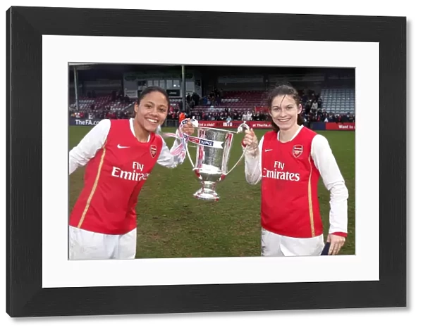 Alex Scott and Karen Carney (Arsenal) with the League Cup Trophy