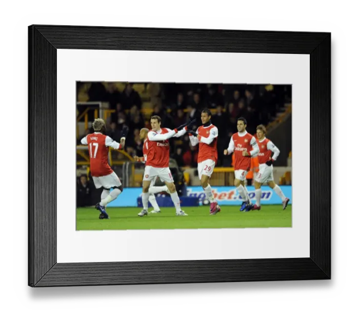 Framed Print : Marouane Chamakh celebrates scoring his and Arsenals 1st goal with Sebastien Squillaci