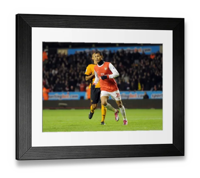Framed Print : Marouane Chamakh celebrates scoring his and Arsenals 2nd goal. Wolverhampton Wanderers 0