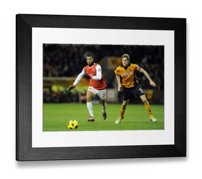 Framed Print : Marouane Chamakh (Arsenal) Richard Stearman (Wolves). Wolverhampton Wanderers 0: 2 Arsenal