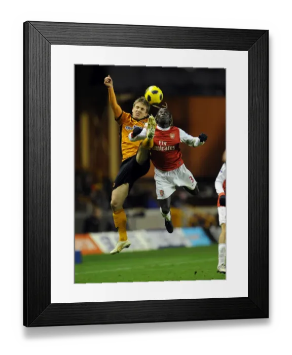 Framed Print : Bacary Sagna (Arsenal) Kevin Doyle (Wolves). Wolverhampton Wanderers 0: 2 Arsenal Framed Print : Bacary Sagna (Arsenal) Kevin Doyle (Wolves). Wolverhampton Wanderers 0: 2 Arsenal