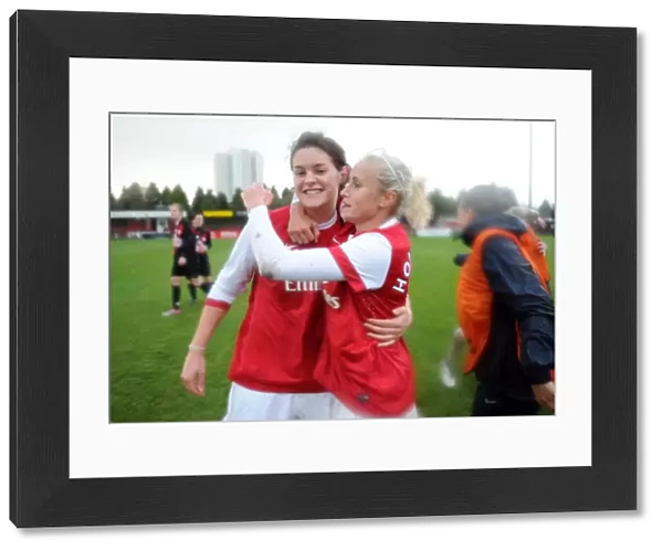 Jennifer Beattie and Steph Houghton (Arsenal) celebrate winning the match