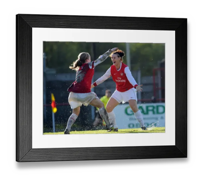 Framed Print : Julie Fleeting and Kim Little: Celebrating Arsenal's Second Goal in UEFA Champions League Victory