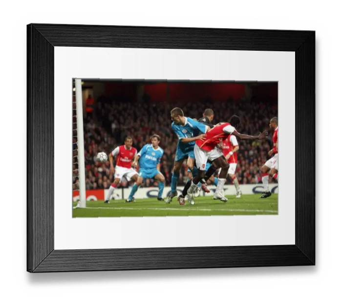 Framed Print : Adebayor's Controversial Own Goal: Arsenal vs. PSV, UEFA Champions League