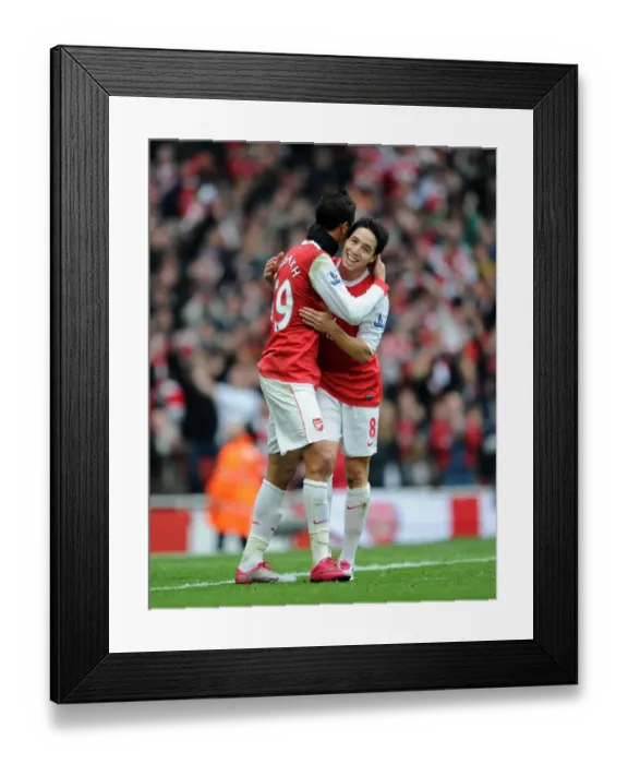 Framed Print : Marouane Chamakh celebrates scoring Arsenals 2nd goal with Samir Nasri