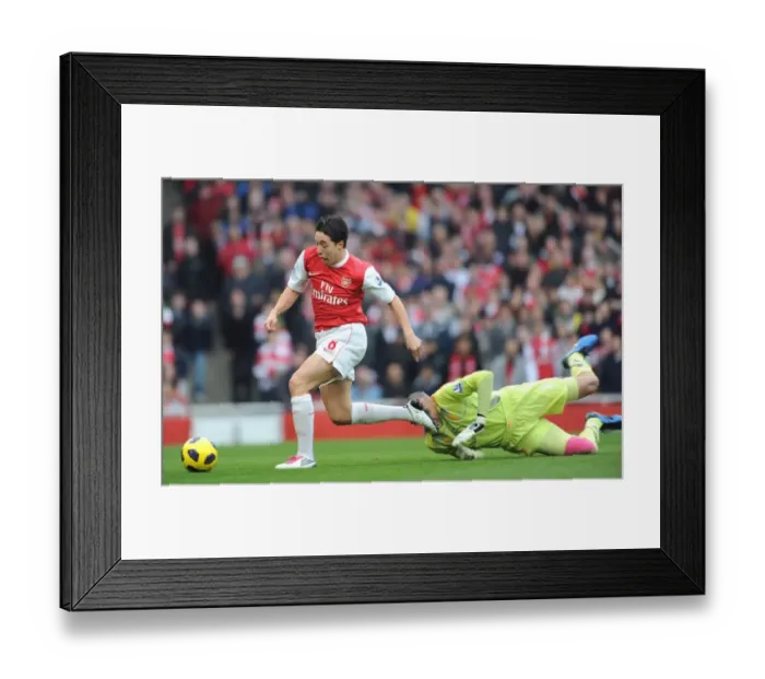 Framed Print : Samir Nasri rounds Heurelho Gomes (Tottenham) to the ball to score Arsenals 1st goal