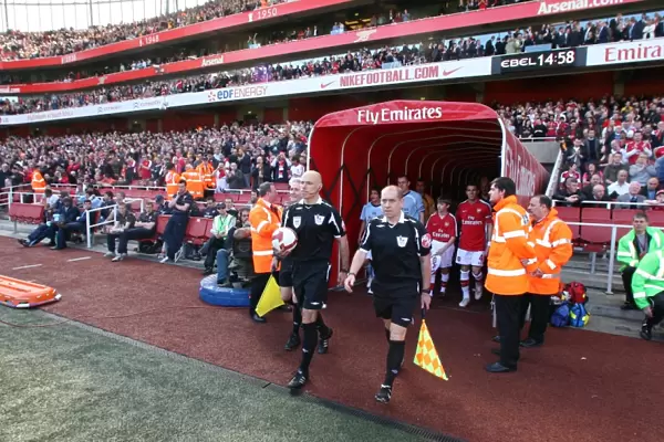 Referee Howard Webb walks out before the match. Arsenal 2: 0 Manchester City