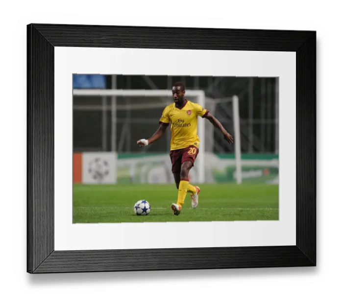 Framed Print : Johan Djourou (Arsenal). SC Braga 2: 0 Arsenal, UEFA Champions League, Group H