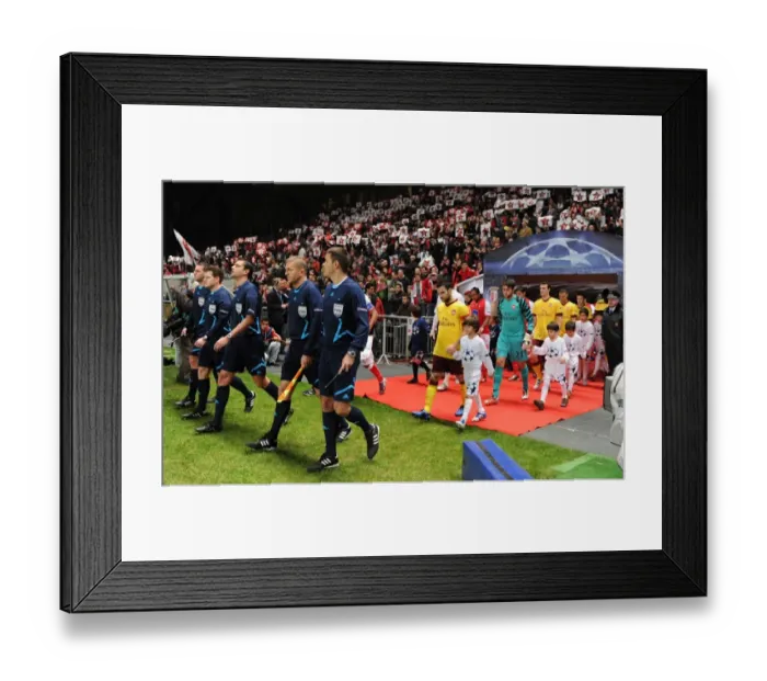 Framed Print : The match officials lead out the teams lead by Arsenal captain Cesc Fabregas