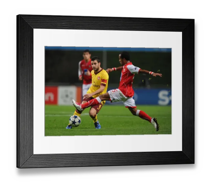 Framed Print : Cesc Fabregas vs. Leandro Salino: Arsenal's UEFA Champions League Victory over SC Braga (2010) Framed Print : Cesc Fabregas vs. Leandro Salino: Arsenal's UEFA Champions League Victory over SC Braga (2010)