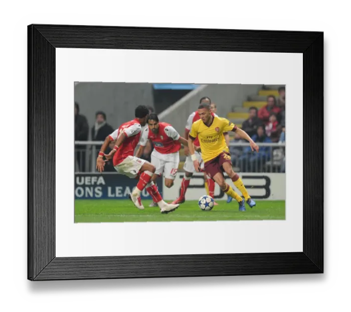 Framed Print : Gibbs vs. Garcia: Arsenal's Defensive Battle at Braga's Fortress, UEFA Champions League 2010 Framed Print : Gibbs vs. Garcia: Arsenal's Defensive Battle at Braga's Fortress, UEFA Champions League 2010